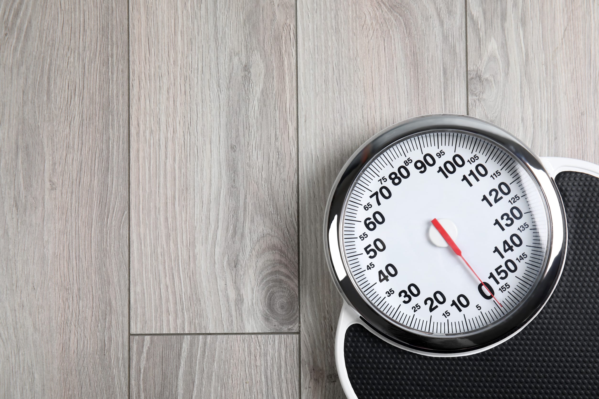 scale with wood floor
